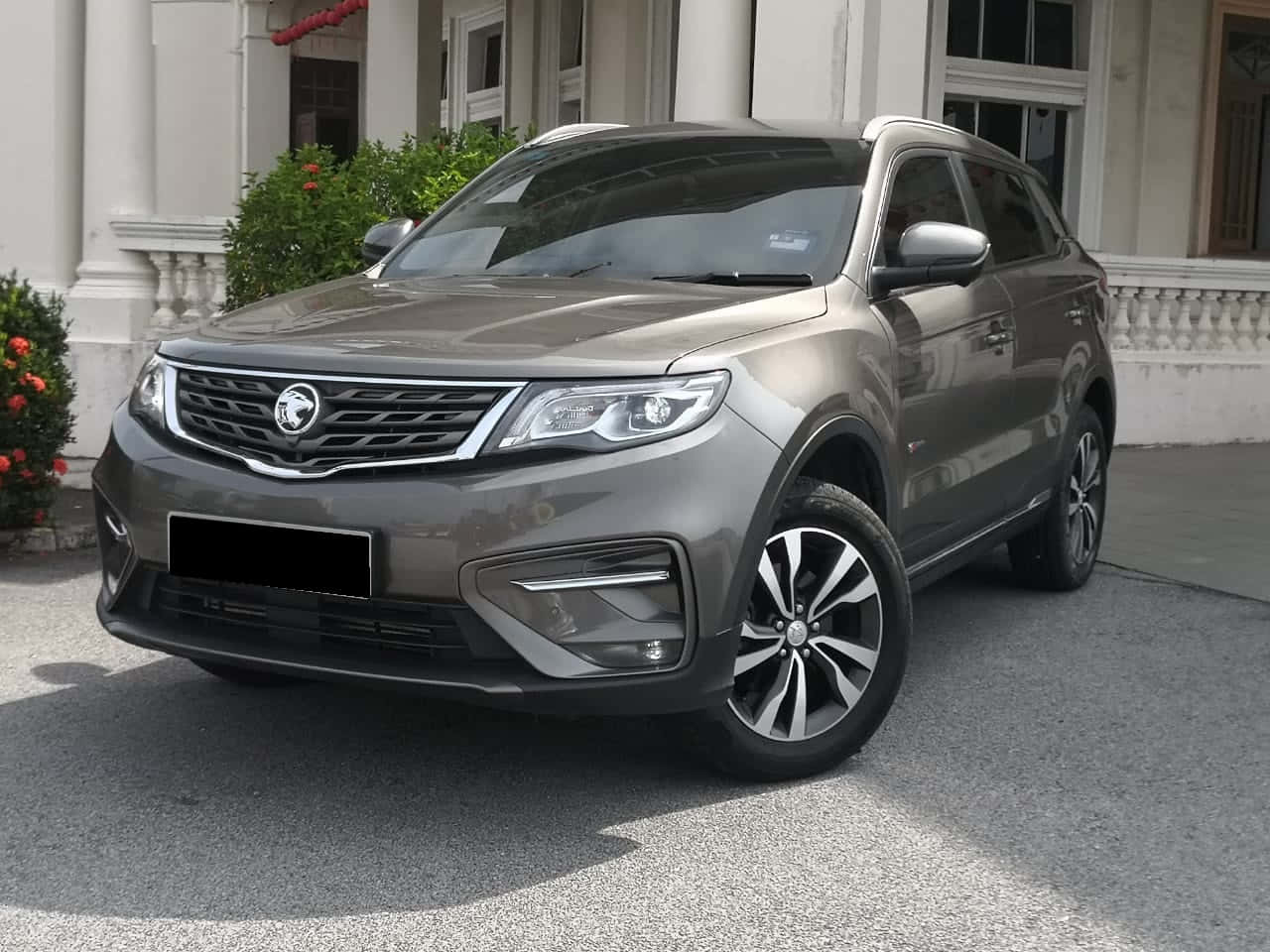 Caption: A Silver Proton X70, Majestically Cruising On The Countryside Road. Wallpaper