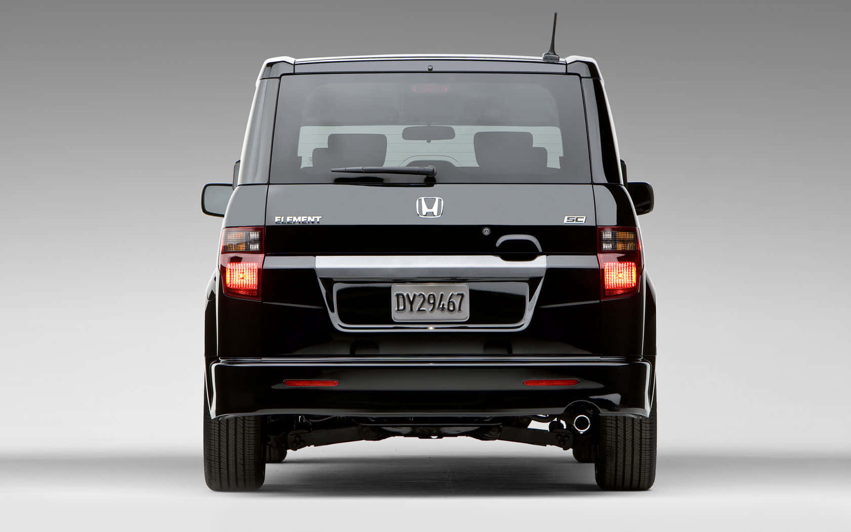 Caption: A Sleek And Modern Honda Element Outdoors Wallpaper