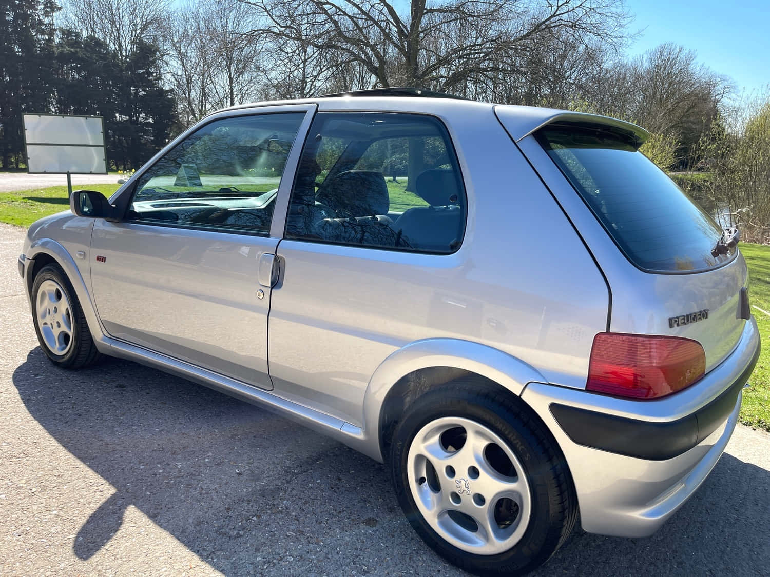 Caption: A Vintage Peugeot 106 In Pristine Condition Wallpaper