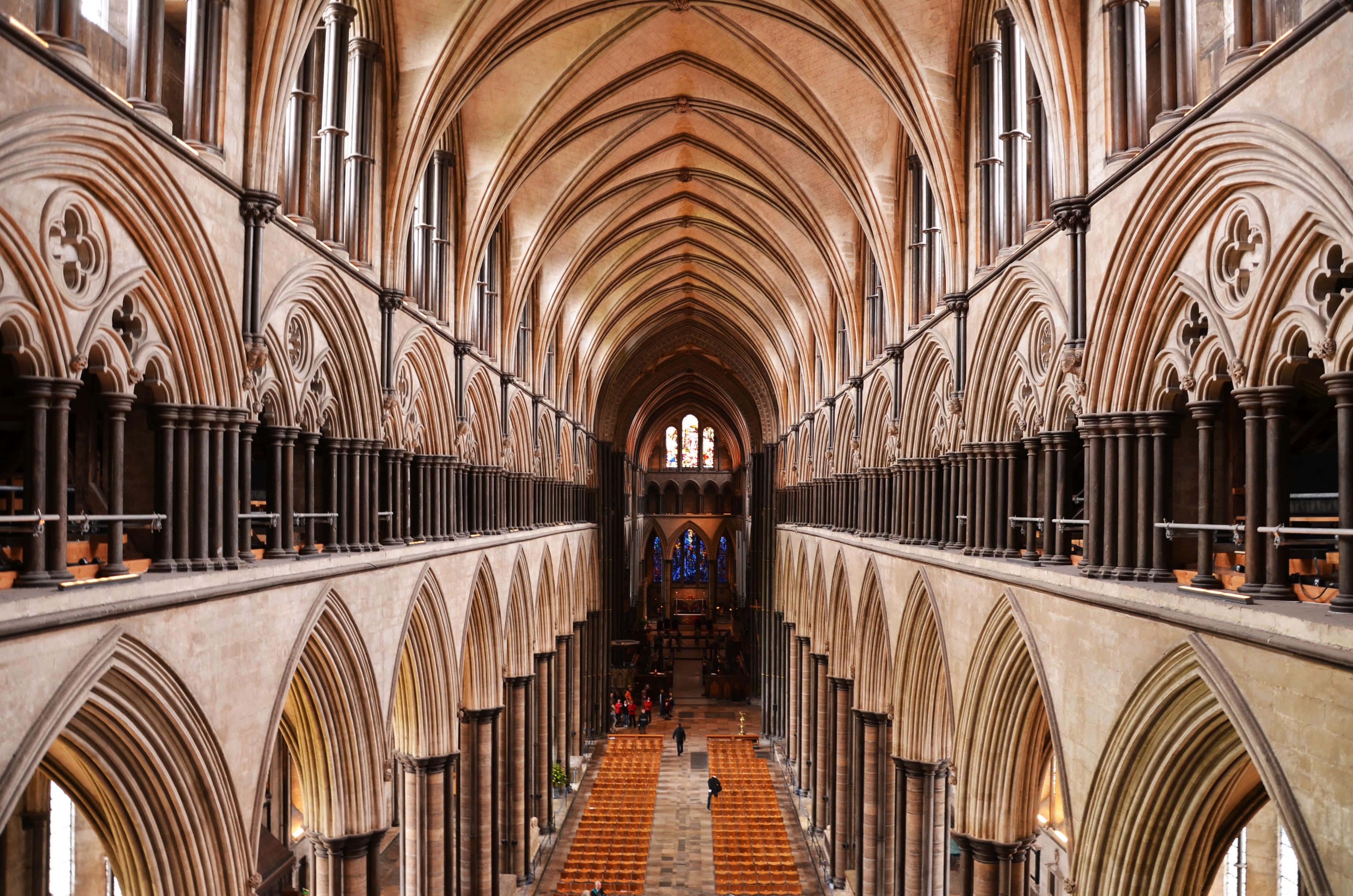 Caption: A Warm Sunrise Over The Salisbury Cathedral Wallpaper