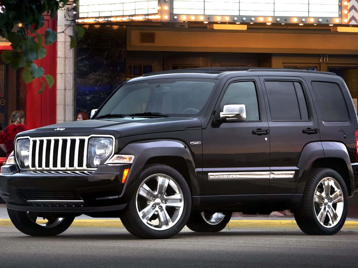 Caption: Adventure Awaits With The Jeep Liberty Wallpaper