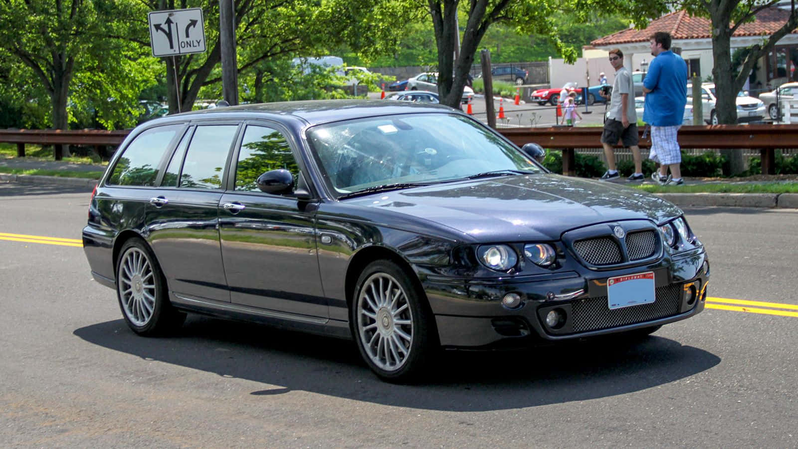 Caption: Aesthetic Red Mg Zt Prowess On Road Wallpaper