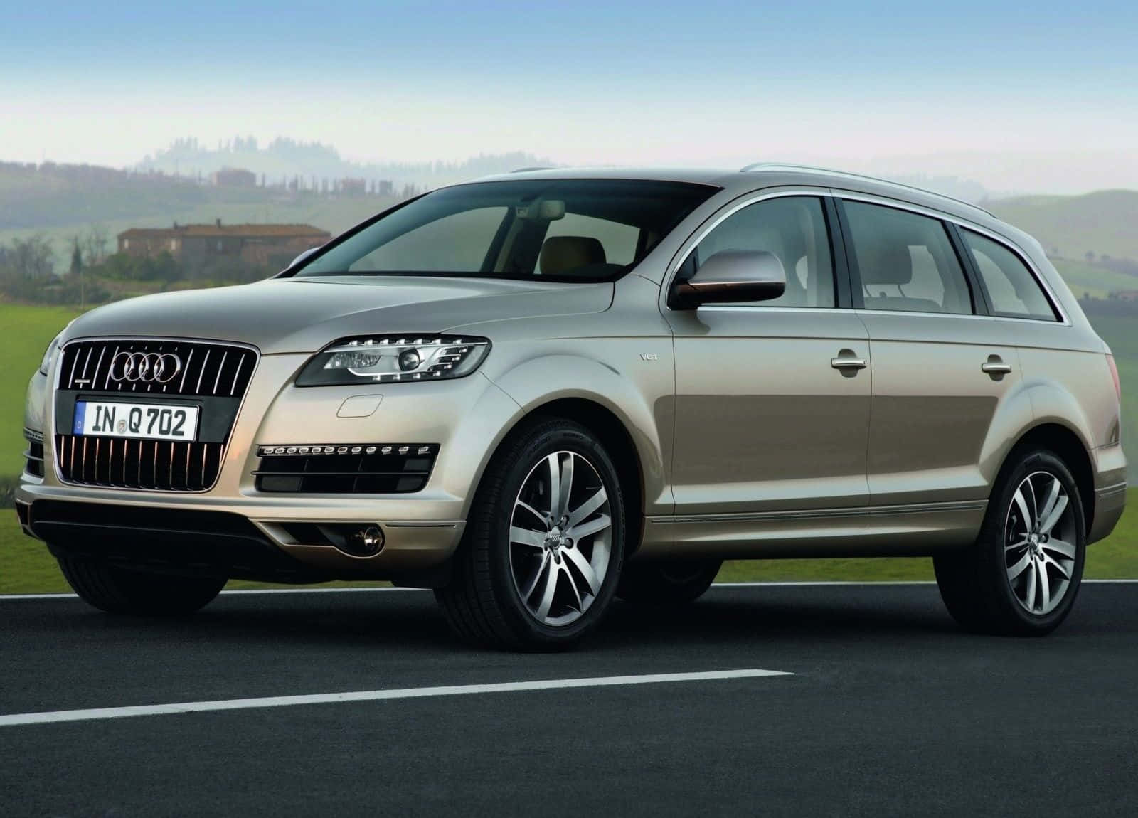 Caption: Audi Q7 - A Stunning Display Of Luxury And Performance Wallpaper