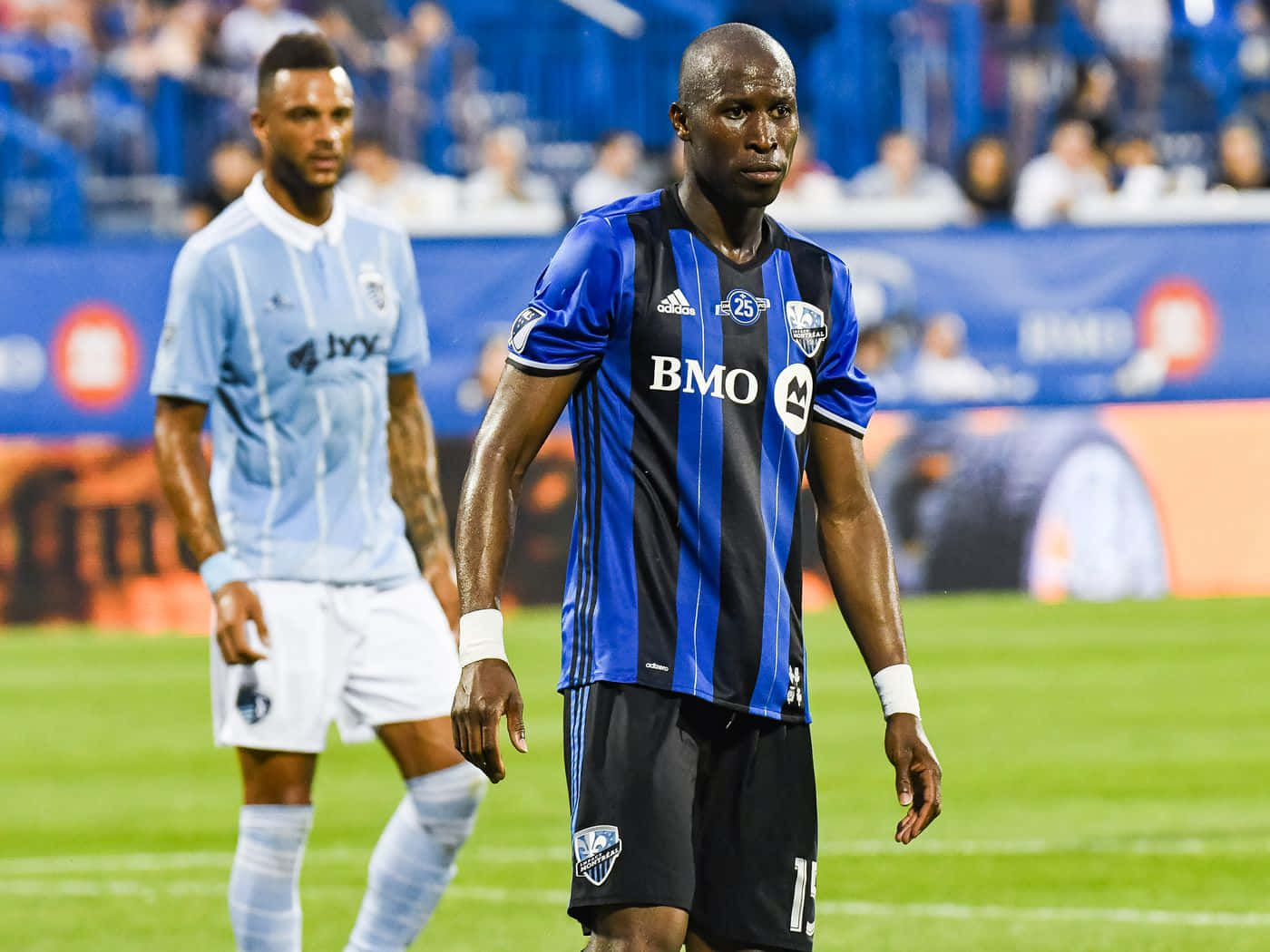 Caption: Ballou Tabla Showcasing His Skills At A Cf Montreal Match Wallpaper