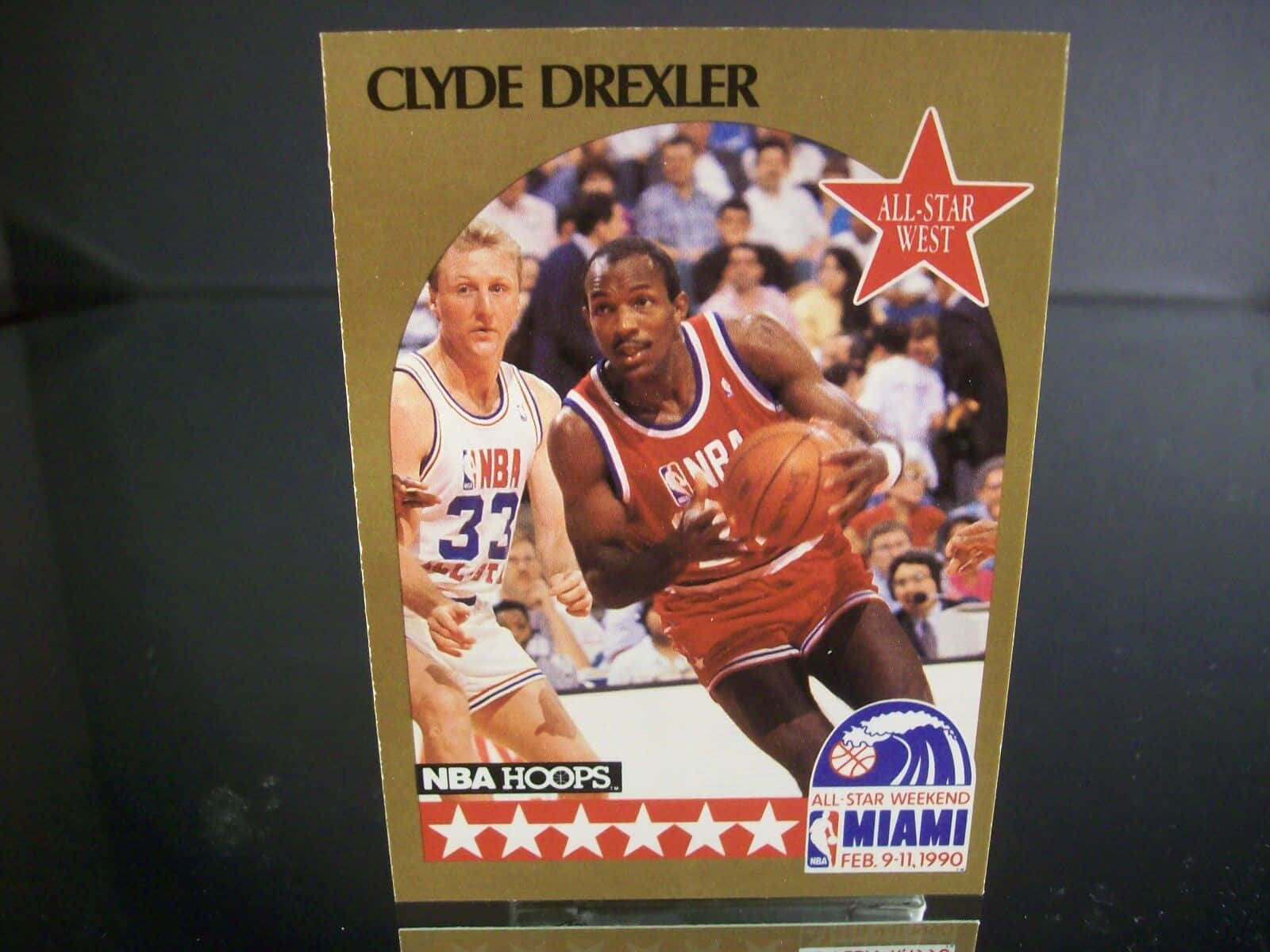 Caption: Basketball Legend Clyde Drexler In Action Wallpaper