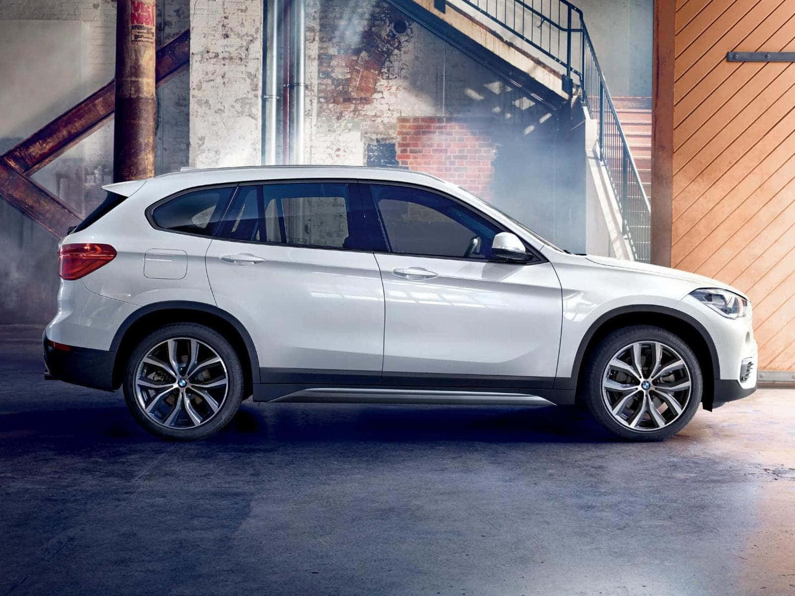 Caption: Bmw X1 In A Stylish Urban Setting Wallpaper