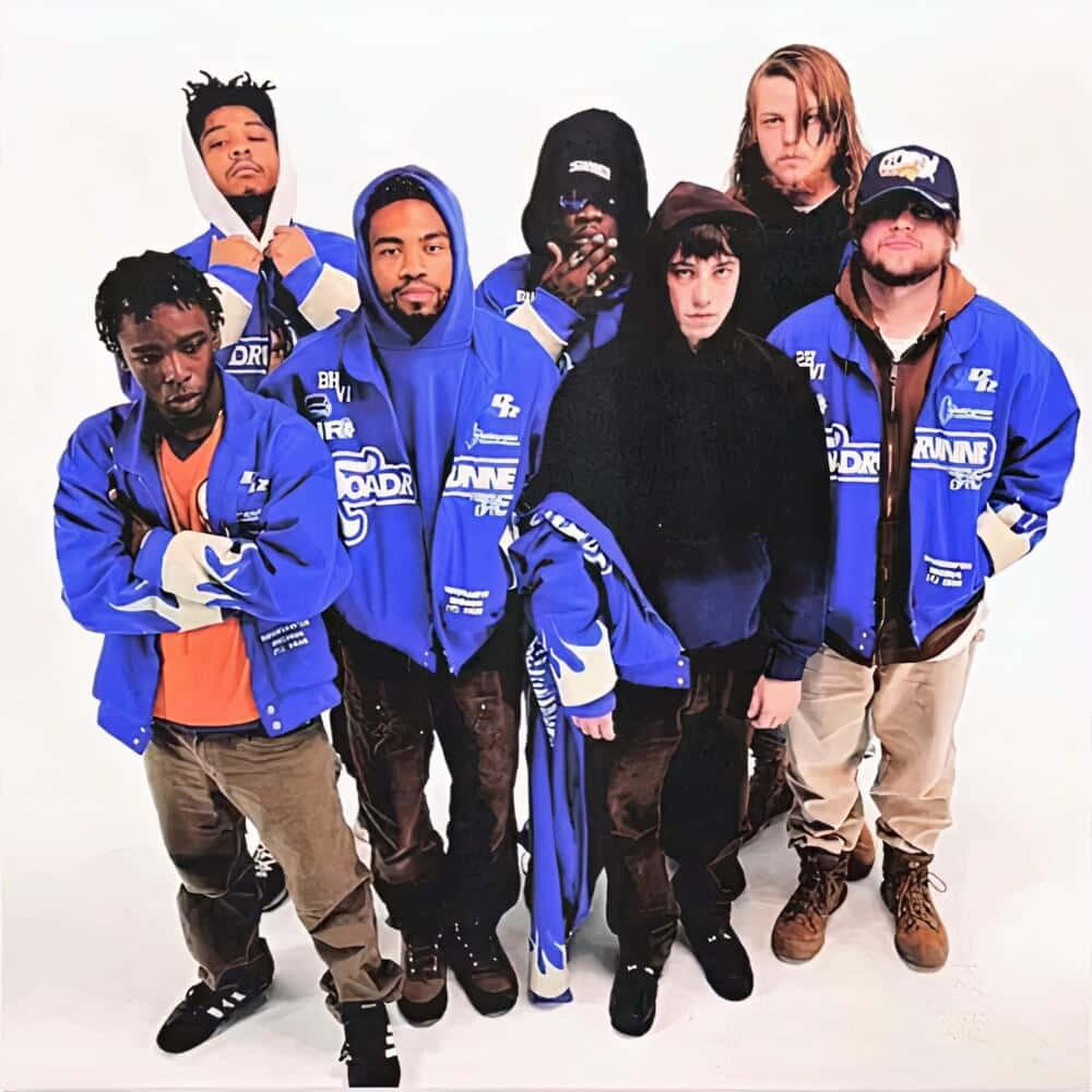 Caption: Brockhampton Group Photo On Colorful Background Wallpaper