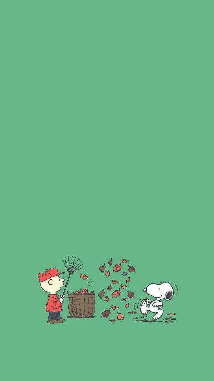 Caption: Celebrate The Christmas Spirit With This Joyful Snoopy Wallpaper For Iphone Wallpaper