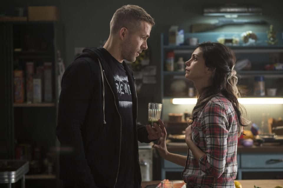 Caption: Deadpool And Vanessa's Romantic Moment Wallpaper