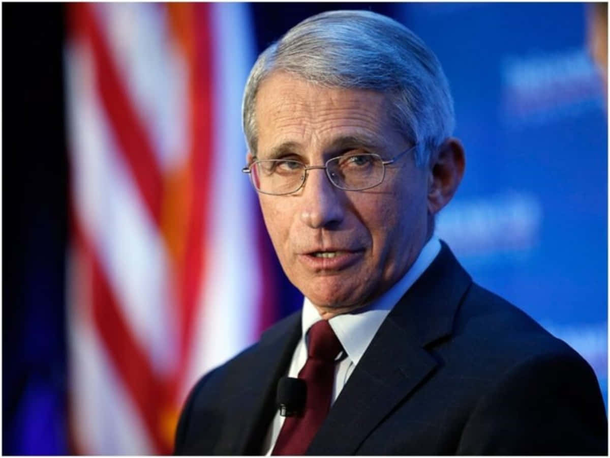 Caption: Dr. Anthony Fauci Delivering Covid-19 Briefing Wallpaper