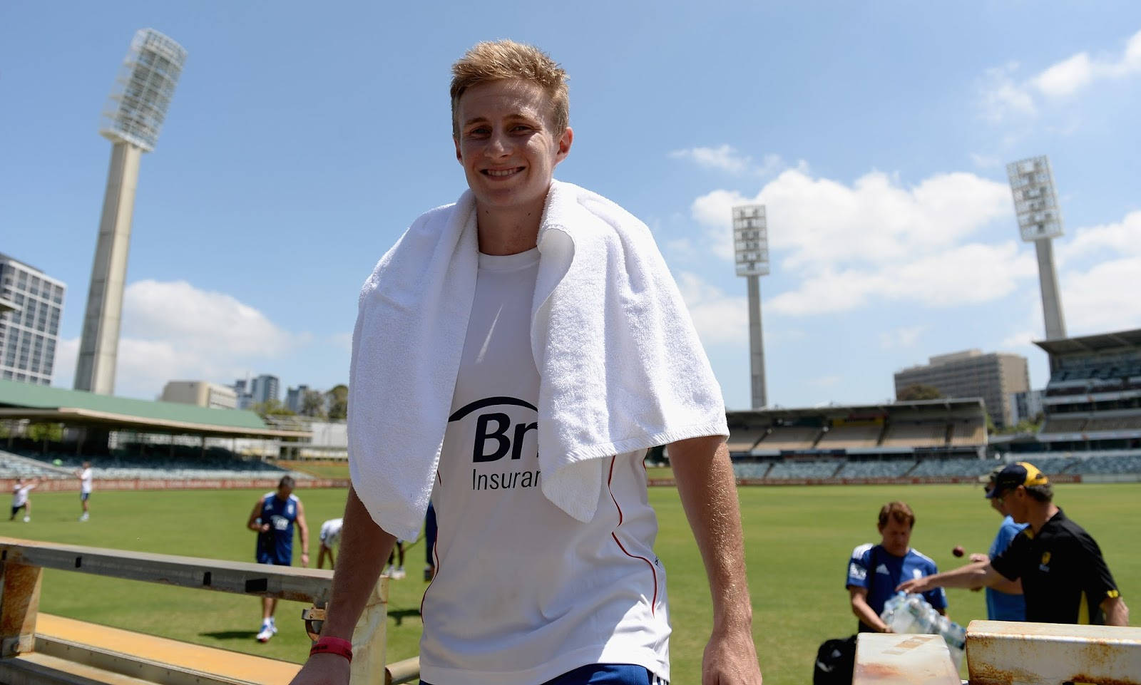 Caption: Dynamic Joe Root Playing Shot At Cricket Stadium Wallpaper