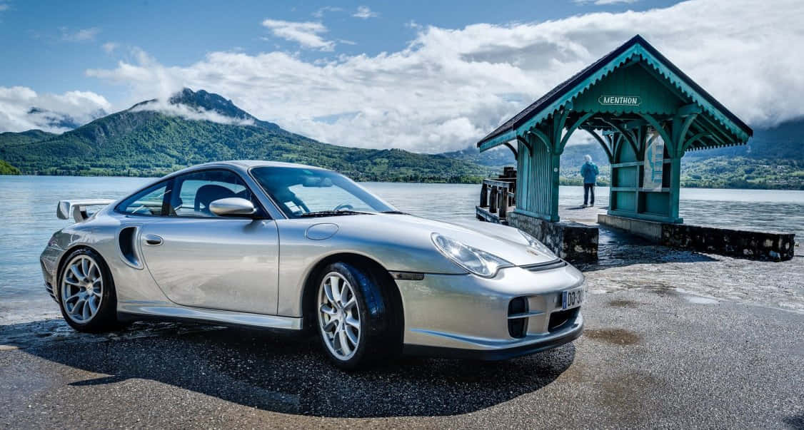 Caption: Fierce Porsche 996 Turbo Showcasing Its Beauty On The Road Wallpaper