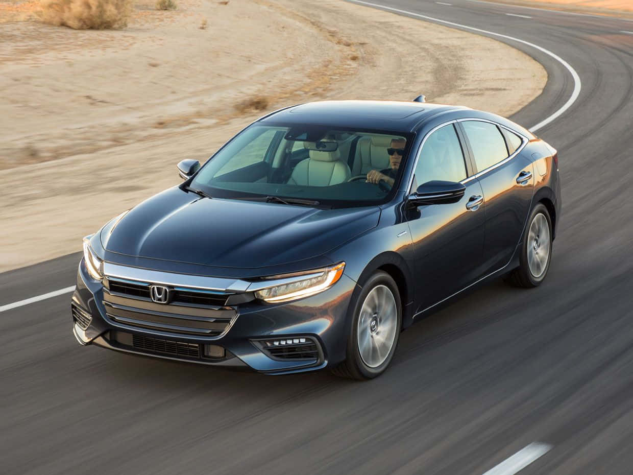 Caption: Honda Insight - Effortless Style And Efficiency Wallpaper