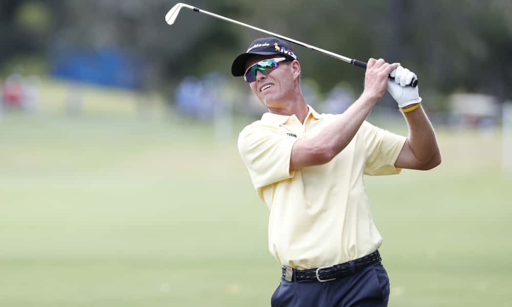 Caption: John Senden Celebrating An Excellent Post-swing Posture Wallpaper