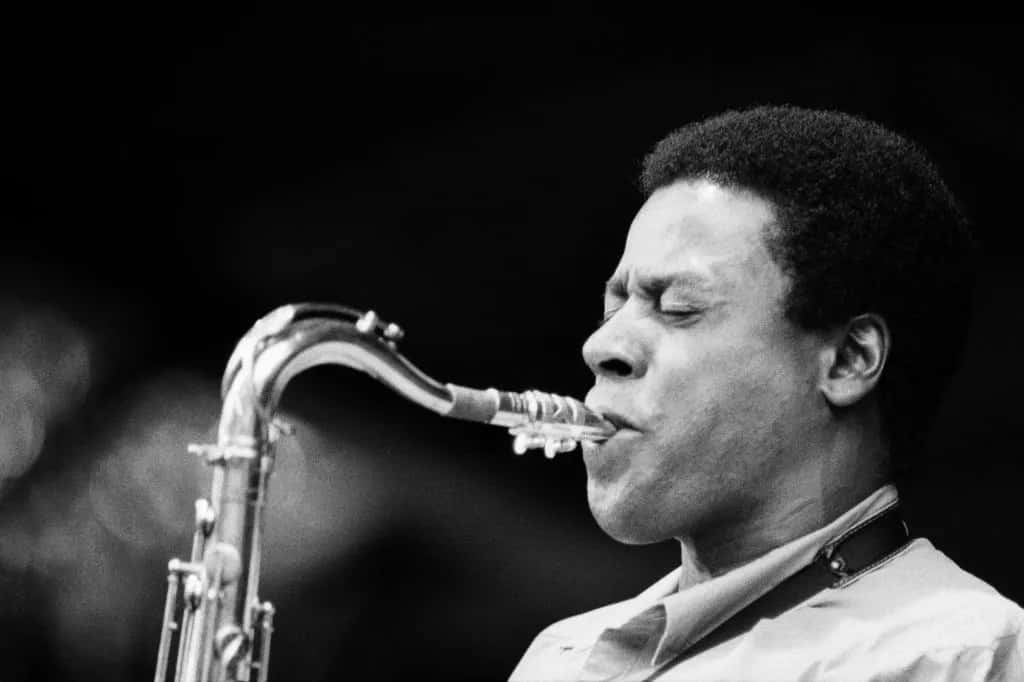 Caption: Legendary Jazz Saxophonist Wayne Shorter Performing Live On Stage Wallpaper