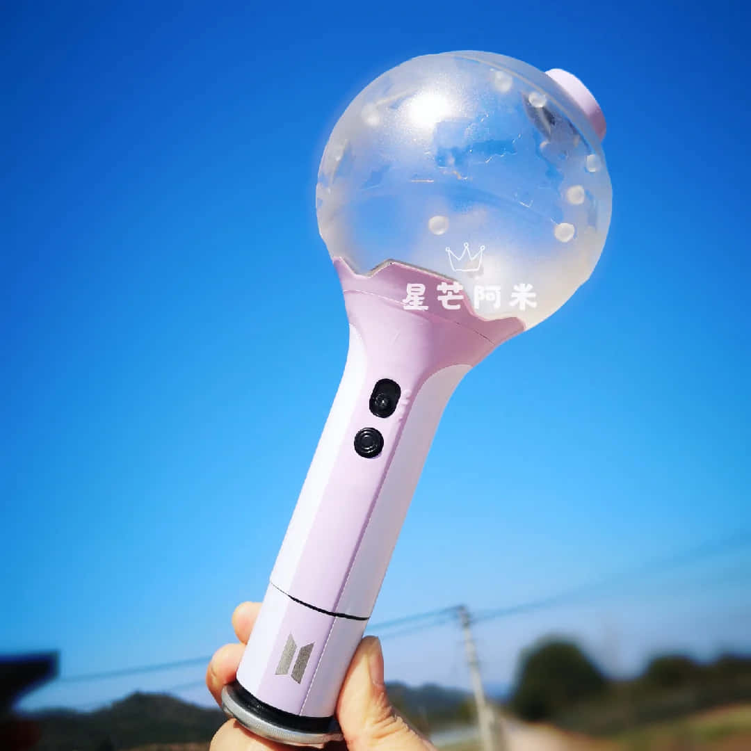 Caption: Light Up The Night With Bts Army Bomb! Wallpaper