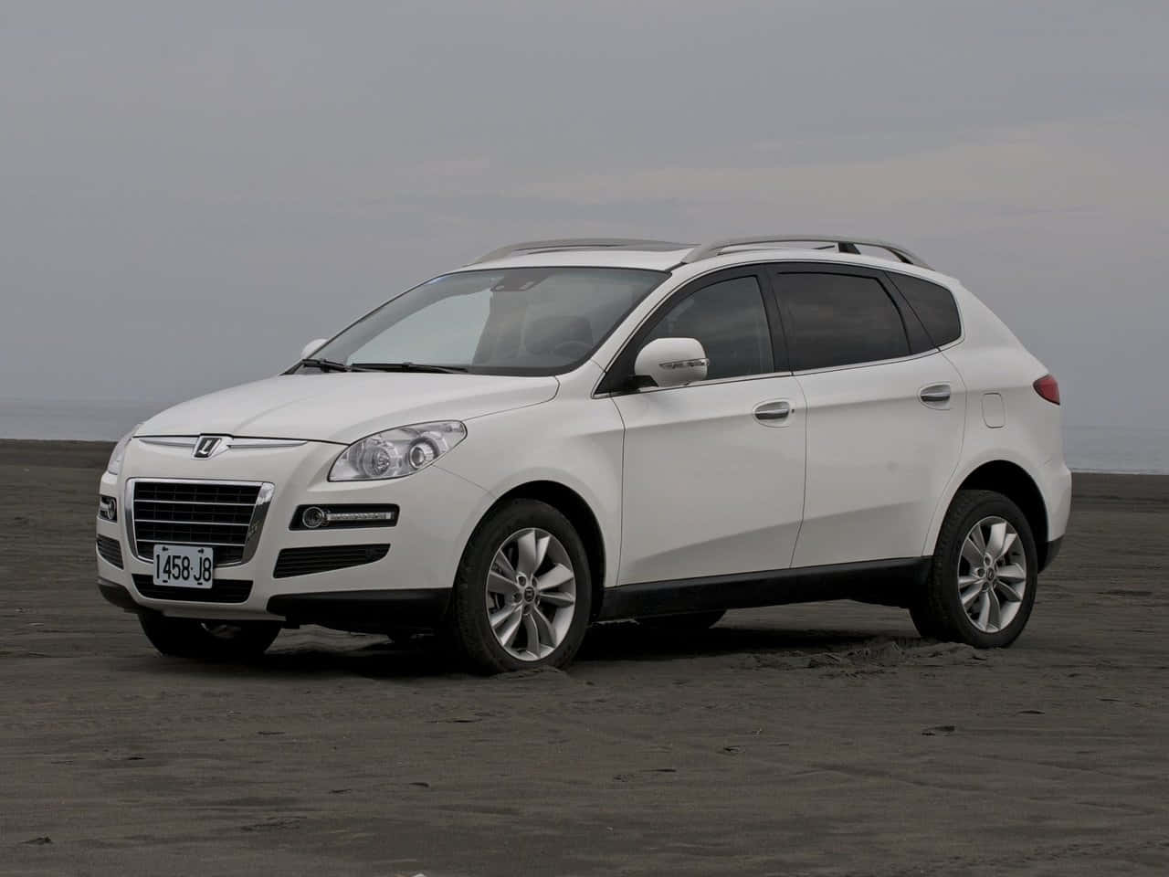 Caption: Luxgen Mpv – A Fusion Of Elegance And Power Wallpaper