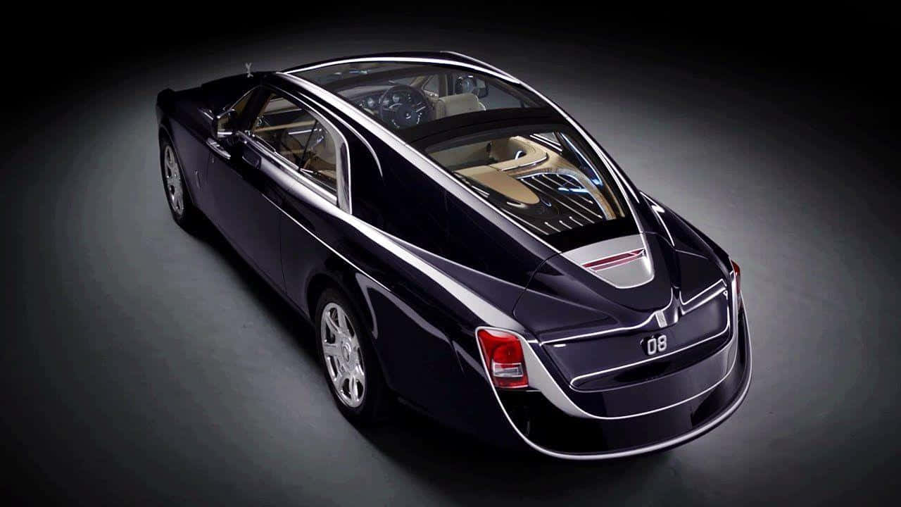 Caption: Luxurious Aesthetics Of Rolls Royce Sweptail Wallpaper