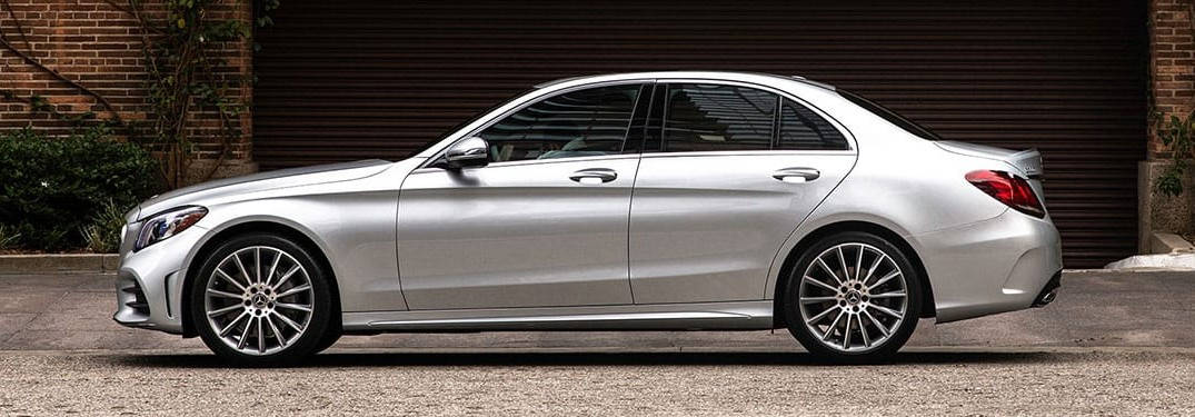 Caption: Luxurious Mercedes Benz C300 With Dark Smoky Glass Wallpaper