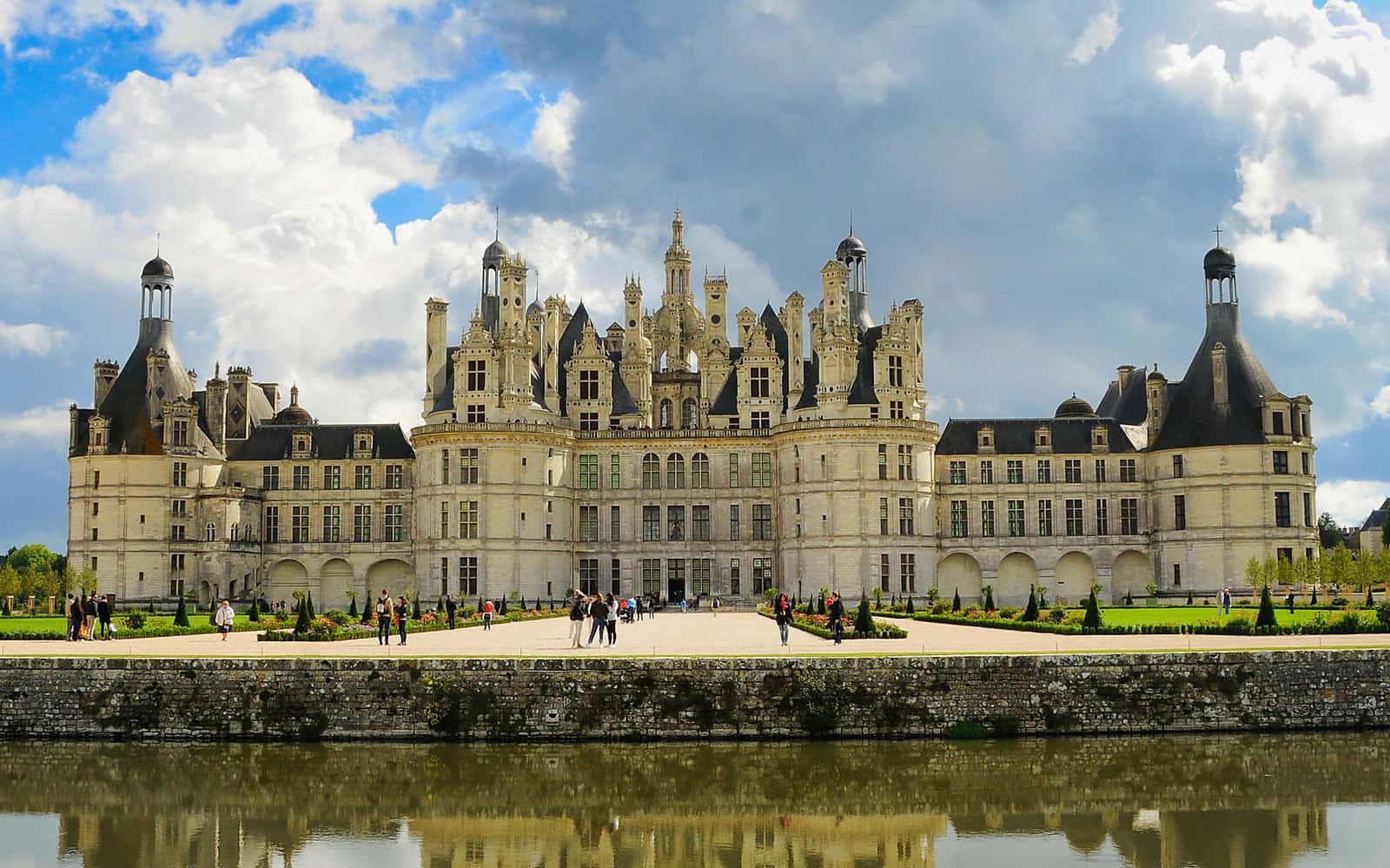 Caption: Majestic Chateau De Chambord At Noontime Wallpaper