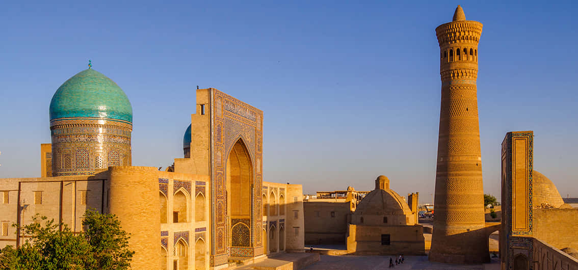 Caption: Majestic Poi Kalan Mosque Complex In Ancient Bukhara Wallpaper