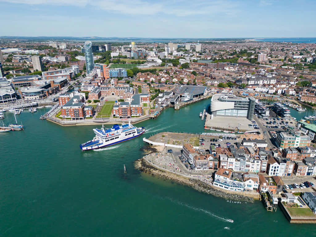 Caption: Majestic View Of Portsmouth Seafront Wallpaper