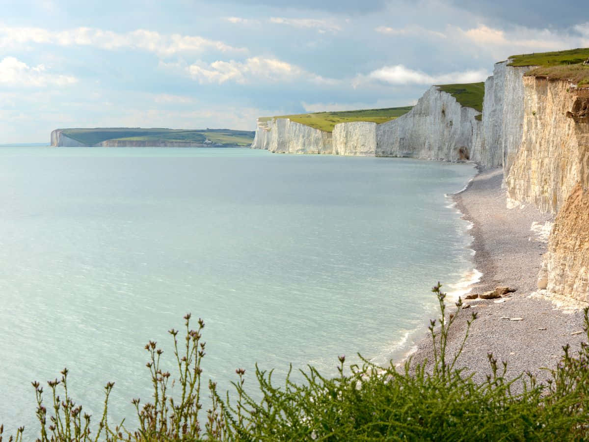 Caption: Majestic View Of White Cliffs Of Dover Wallpaper