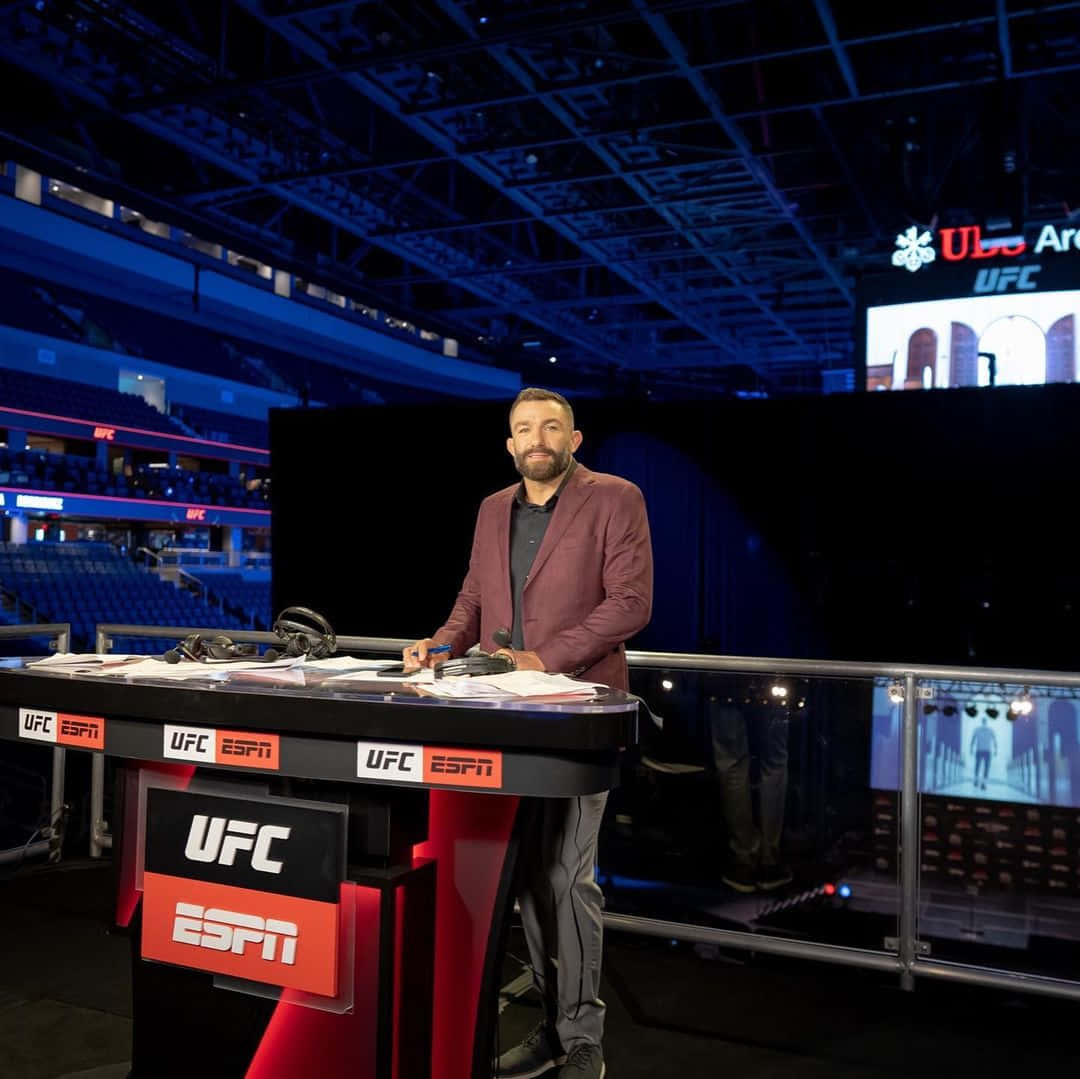 Caption: Michael Chiesa, Engaging Sports Analyst And Commentator Wallpaper