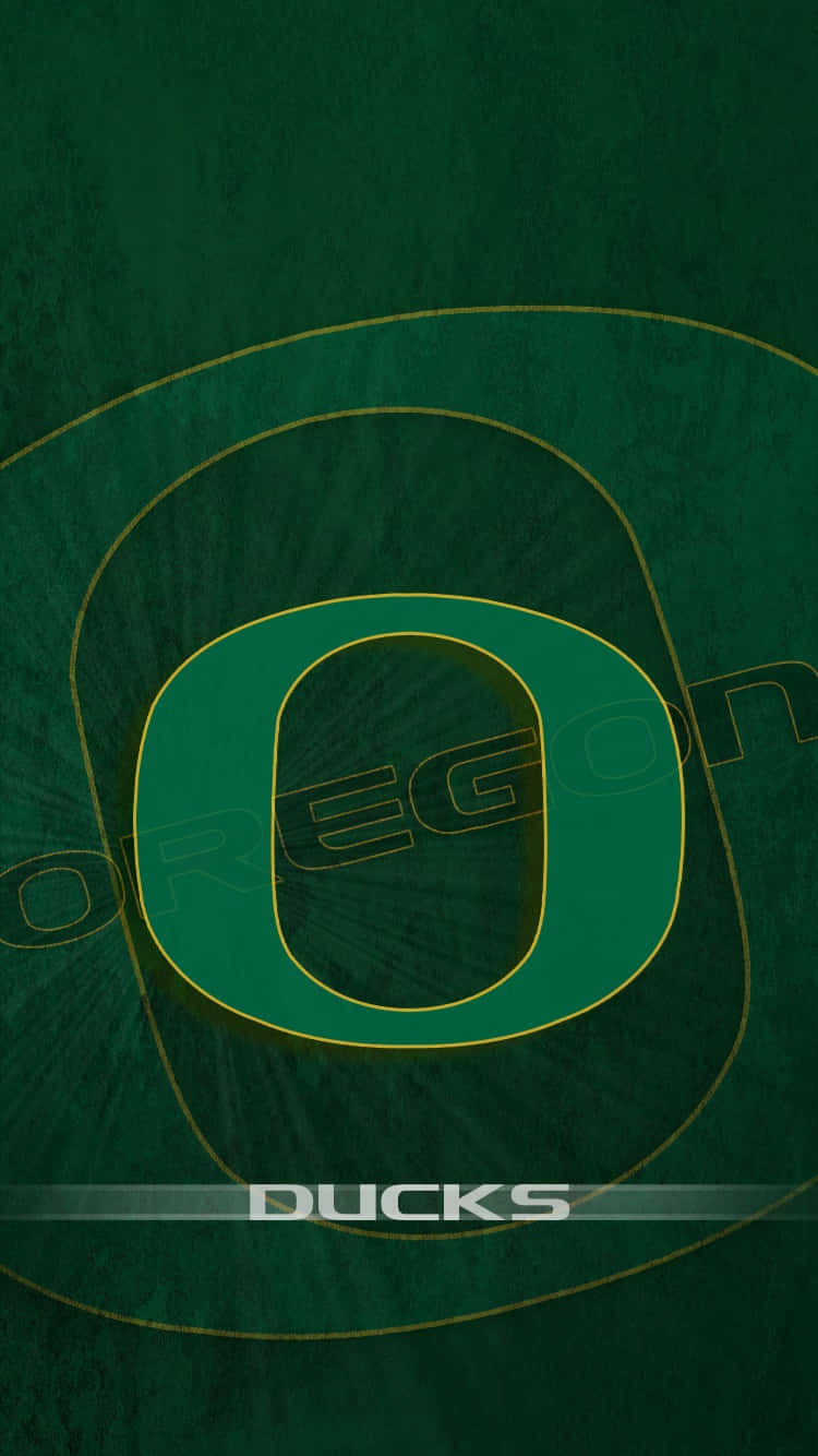 Caption: Oregon Ducks Football Team Charging Onto The Field Wallpaper