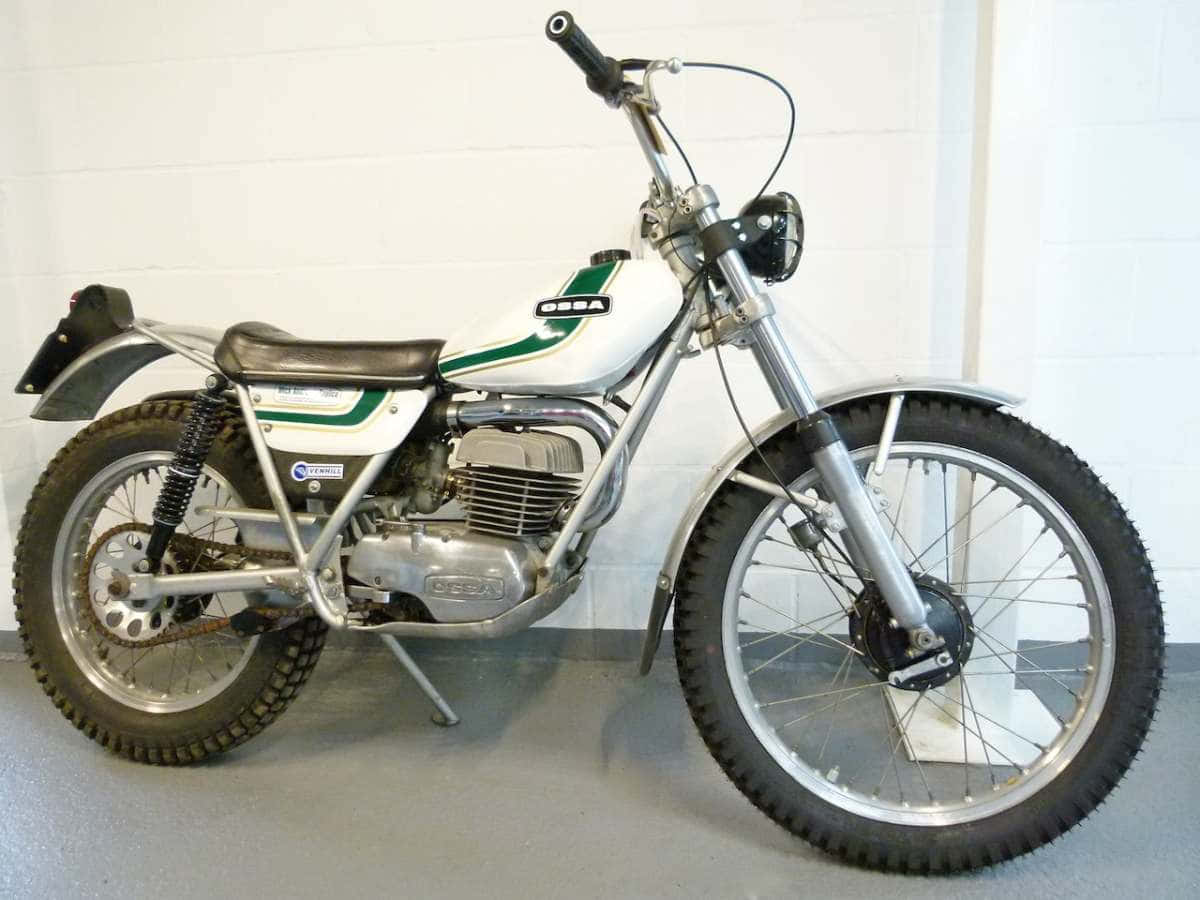 Caption: Ossa Motorcycle In Action Wallpaper