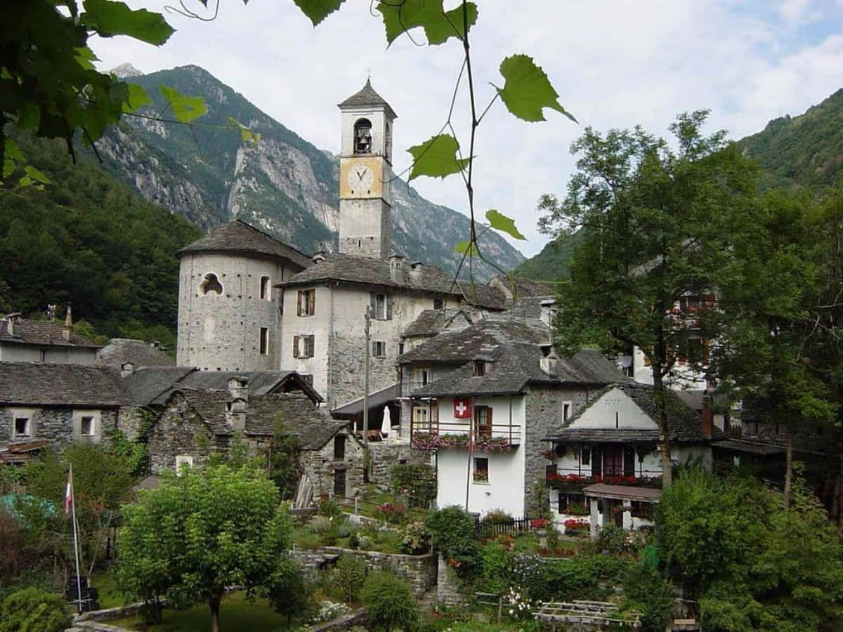 Caption: Picturesque Locarno Landscape On A Sunny Day Wallpaper