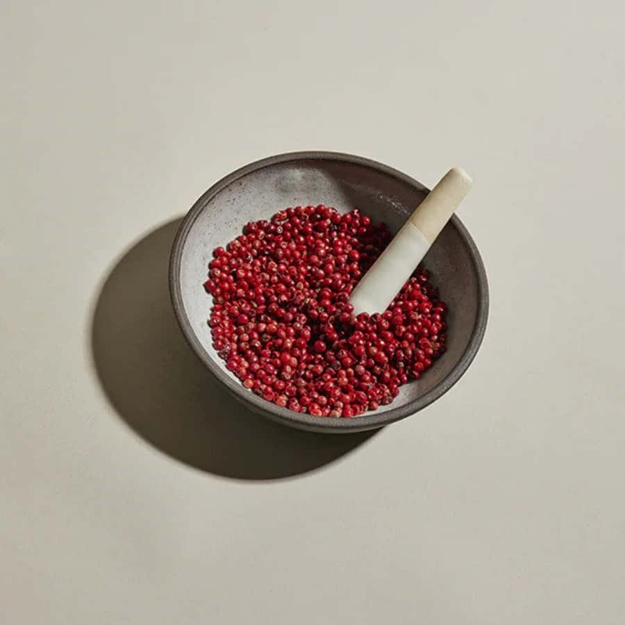 Caption: Pink Peppercorn Close-up Wallpaper