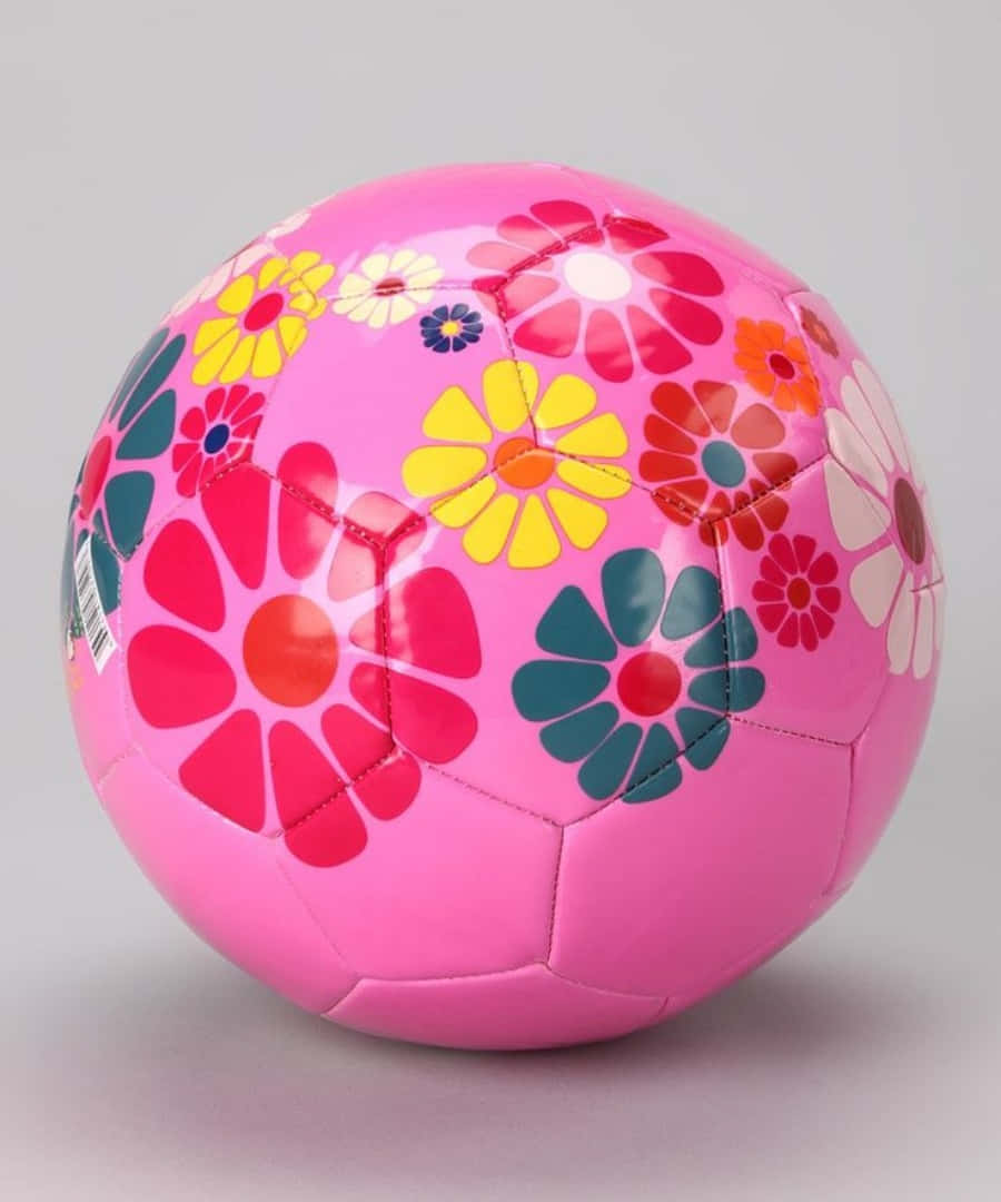 Caption: Play In Style With A Pink Soccer Ball! Wallpaper