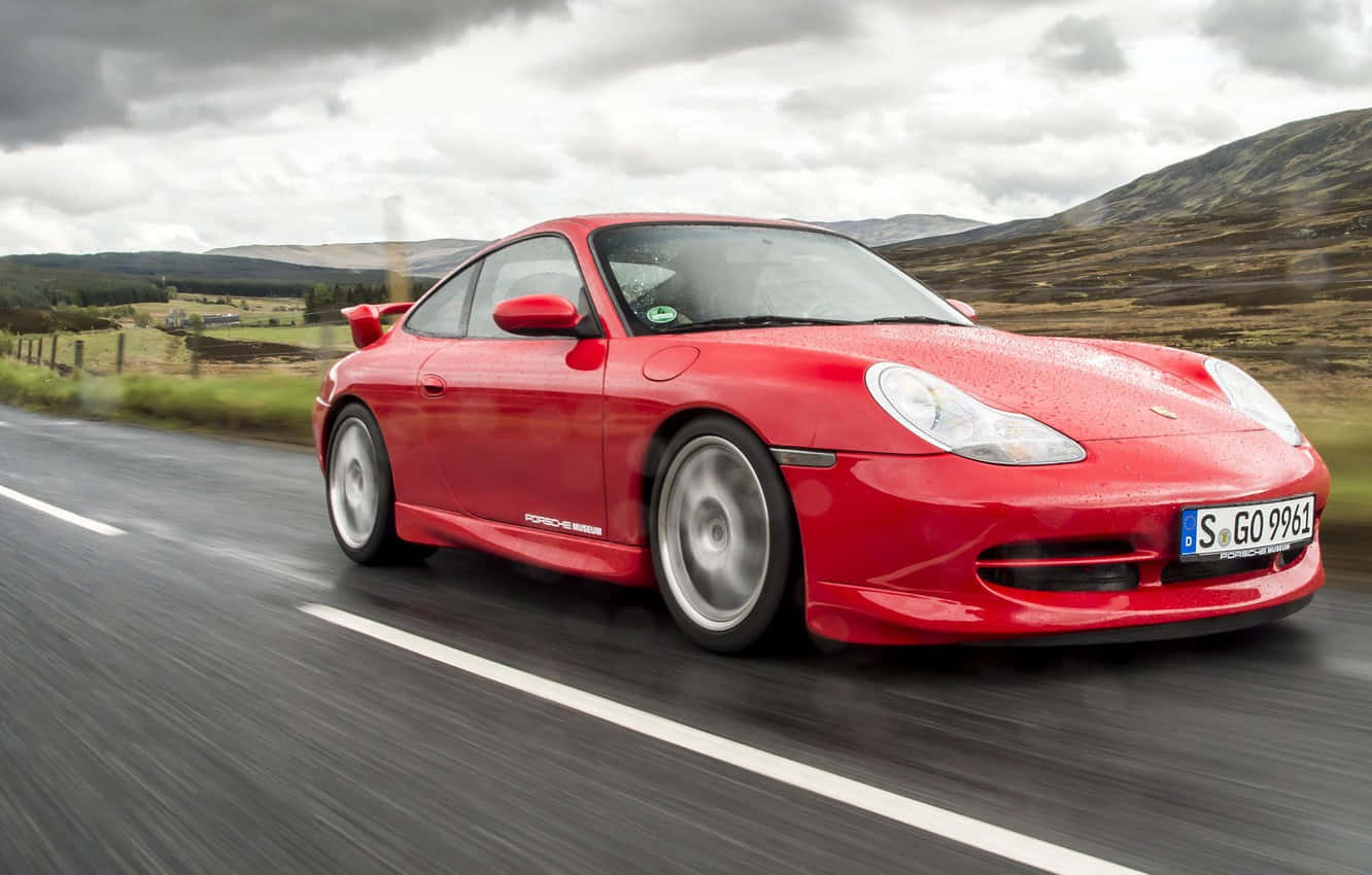 Caption: Pristine Porsche 996 Under A Magical Dusk Sky. Wallpaper