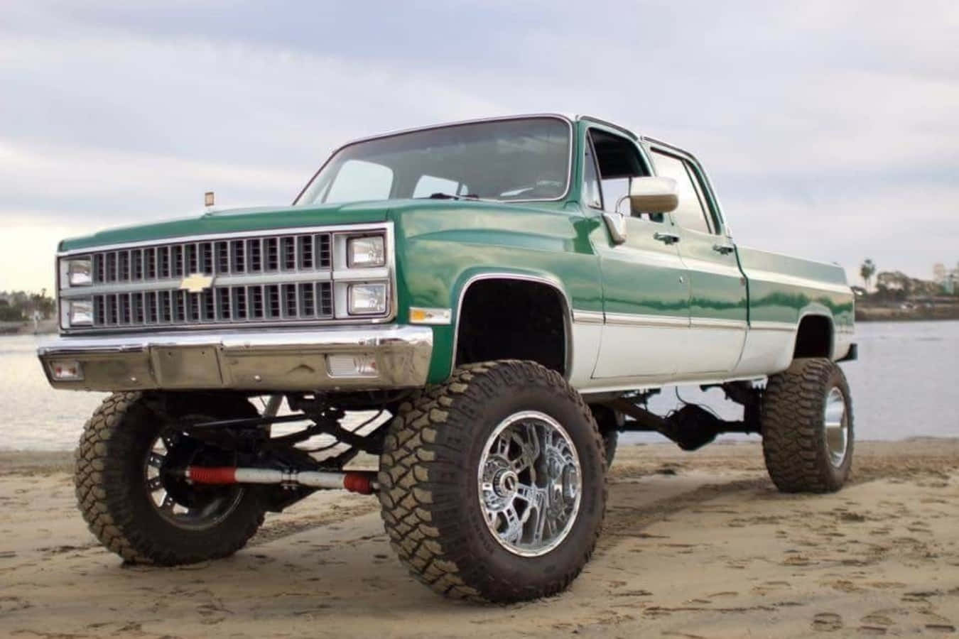 Caption: Rugged Square Body Truck Showcasing American Strength Wallpaper