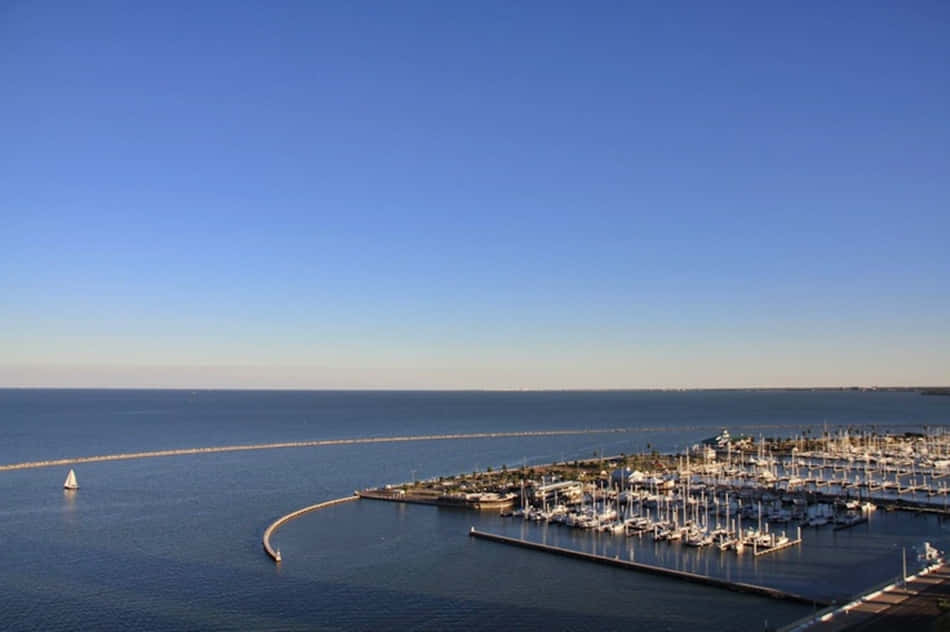 Caption: Serene Sunset Over The Corpus Christi Bayfront Wallpaper