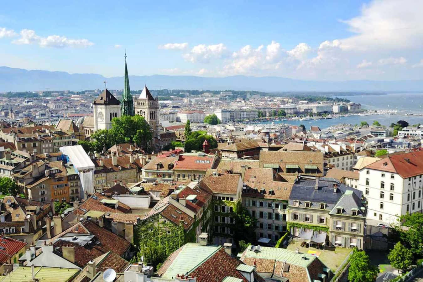 Caption: Serene View Of Lake Geneva With The Swiss Alps In The Background. Wallpaper