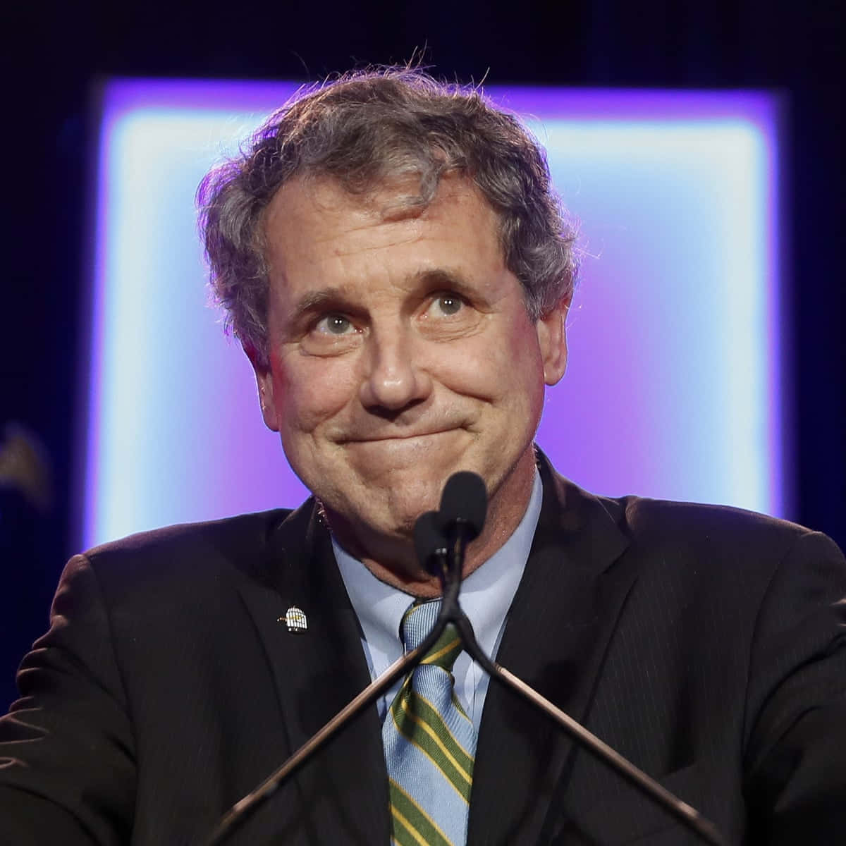 Caption: Sherrod Brown With A Grinning Expression Wallpaper