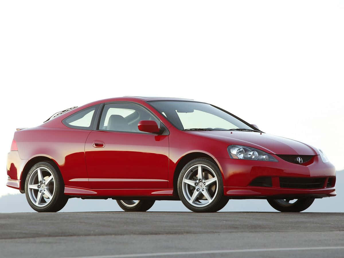 Caption: Sleek Acura Rsx On The Go Wallpaper