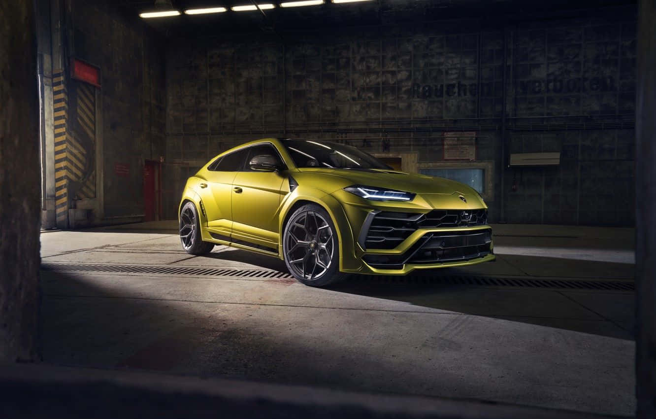 Caption: Sleek And Powerful Lamborghini Urus Wallpaper