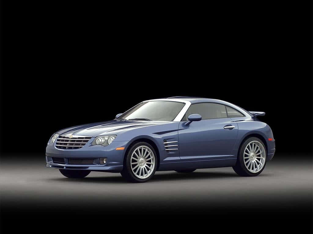 Caption: Sleek And Stylish Chrysler Crossfire On The Road Wallpaper