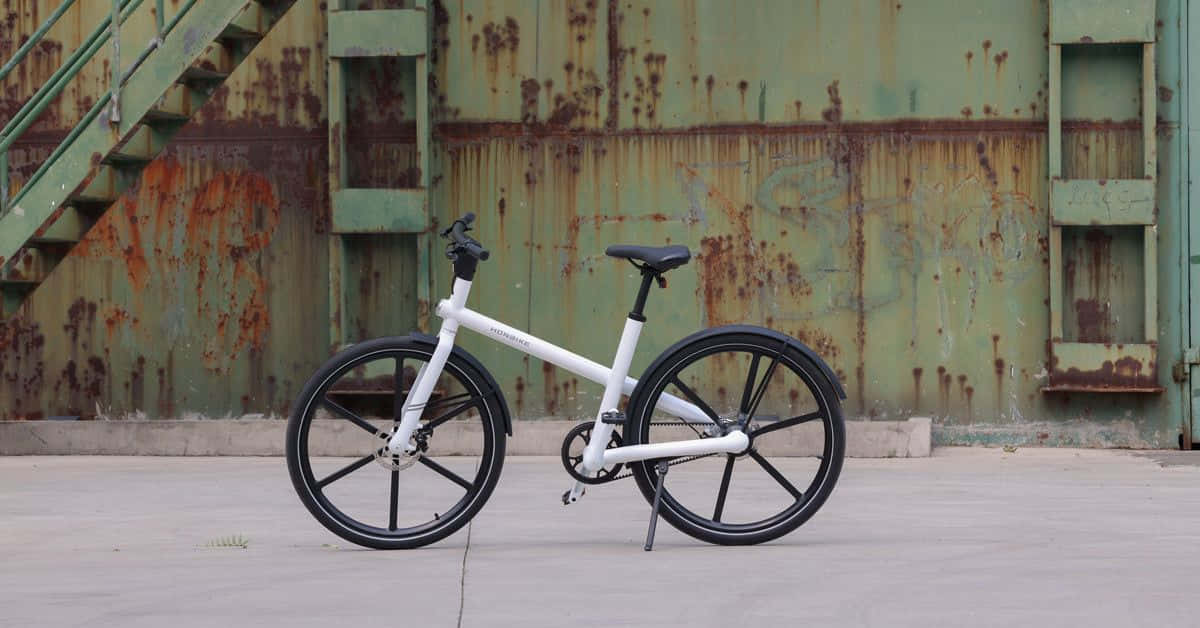 Caption: Sleek And Stylish Electric Bike Wallpaper