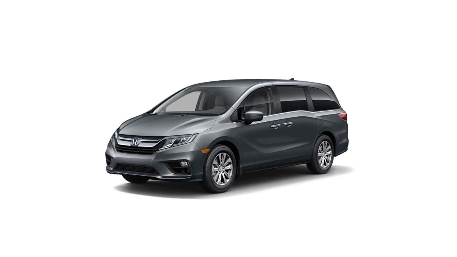 Caption: Sleek And Stylish Honda Odyssey In Urban Environment Wallpaper