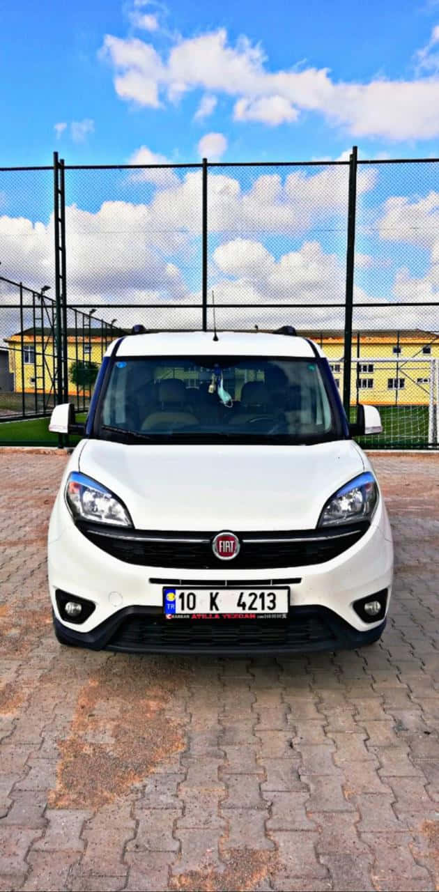 Caption: Sleek And Versatile Fiat Doblo Wallpaper