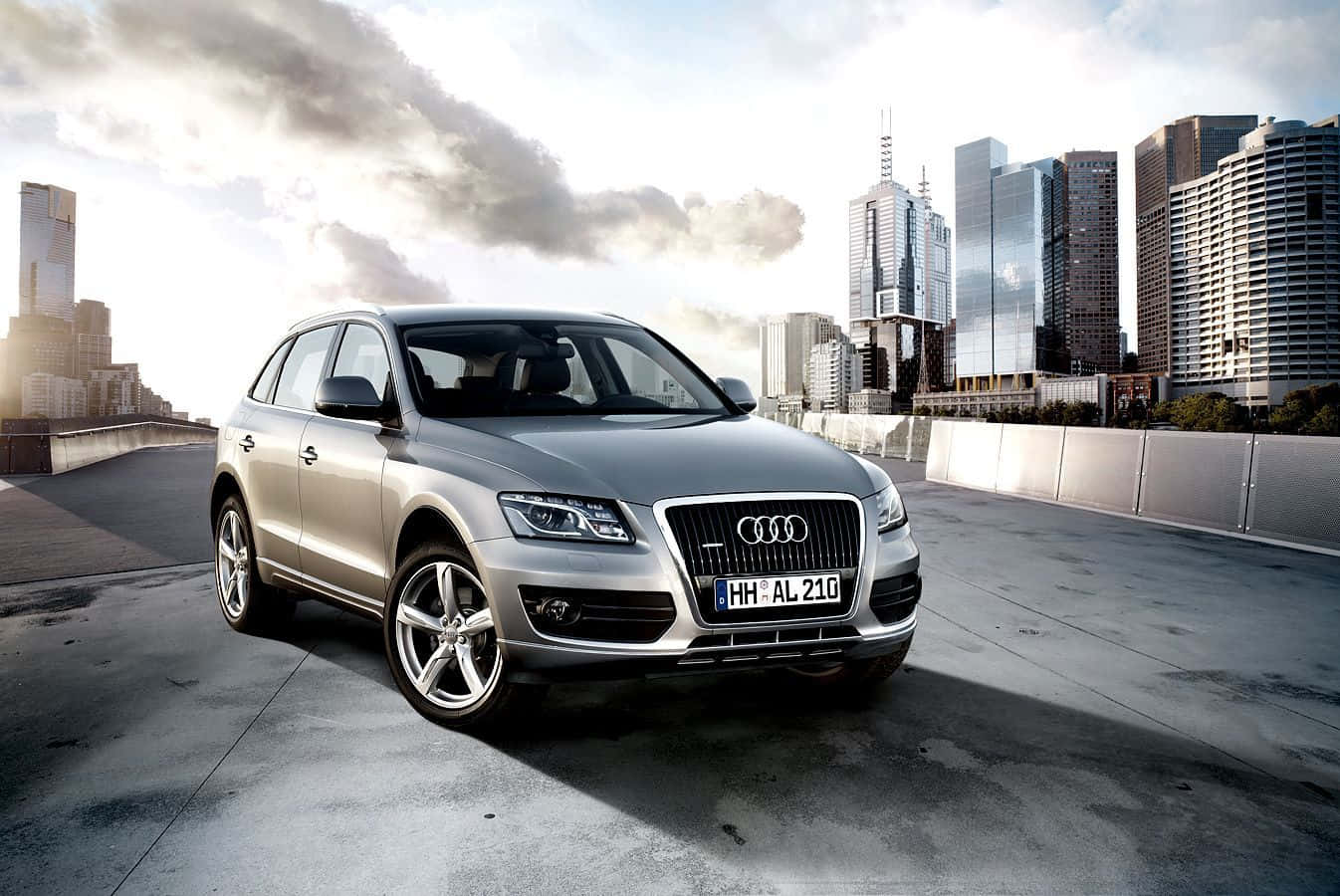 Caption: Sleek Audi Q5 On Open Road Wallpaper