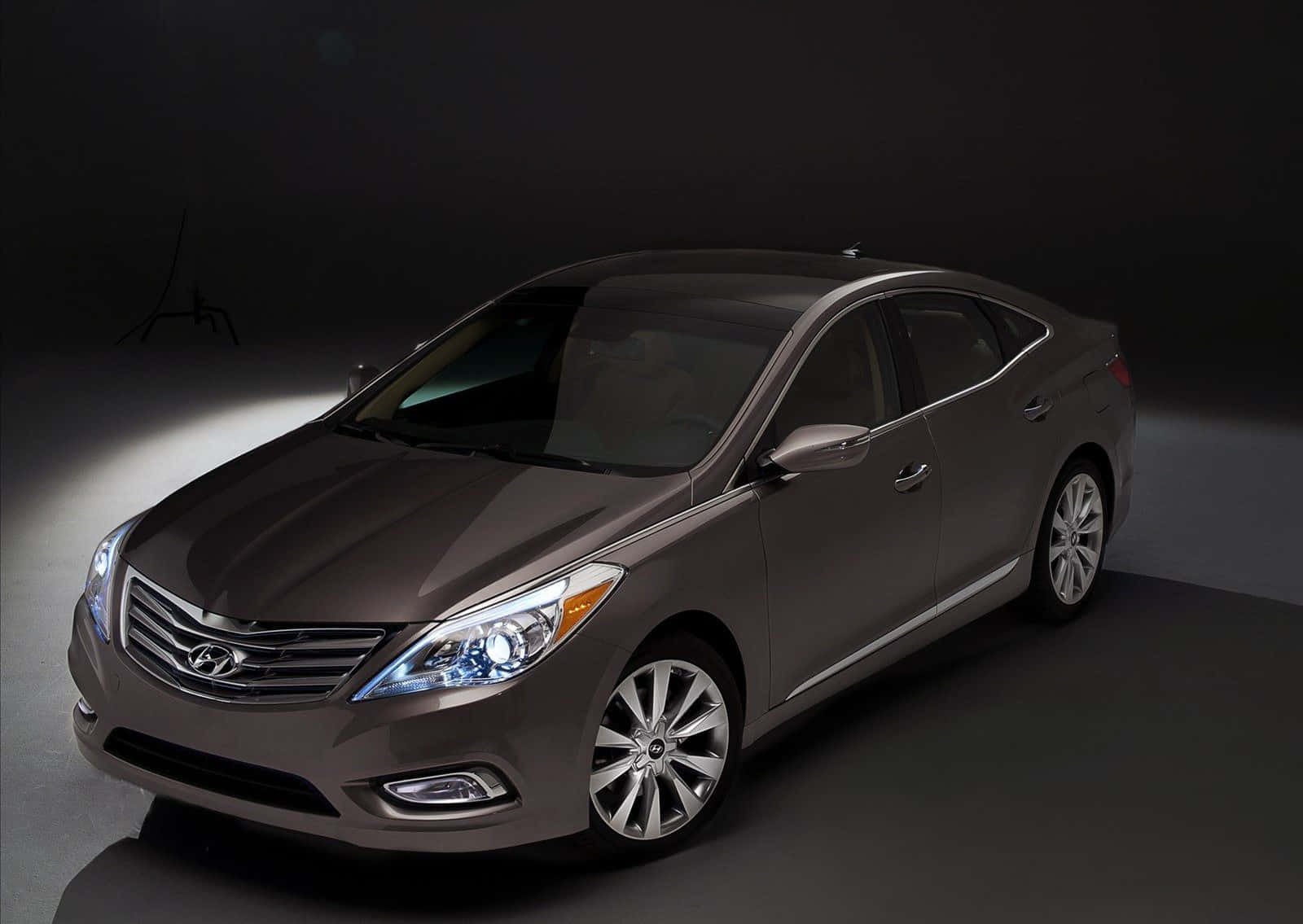 Caption: Sleek Black Hyundai Azera - A Perfect Blend Of Luxury And Performance Wallpaper