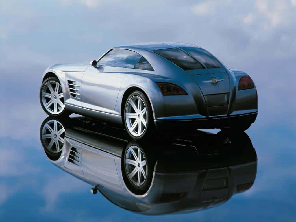 Caption: Sleek Chrysler Crossfire In A Stunning Setting Wallpaper