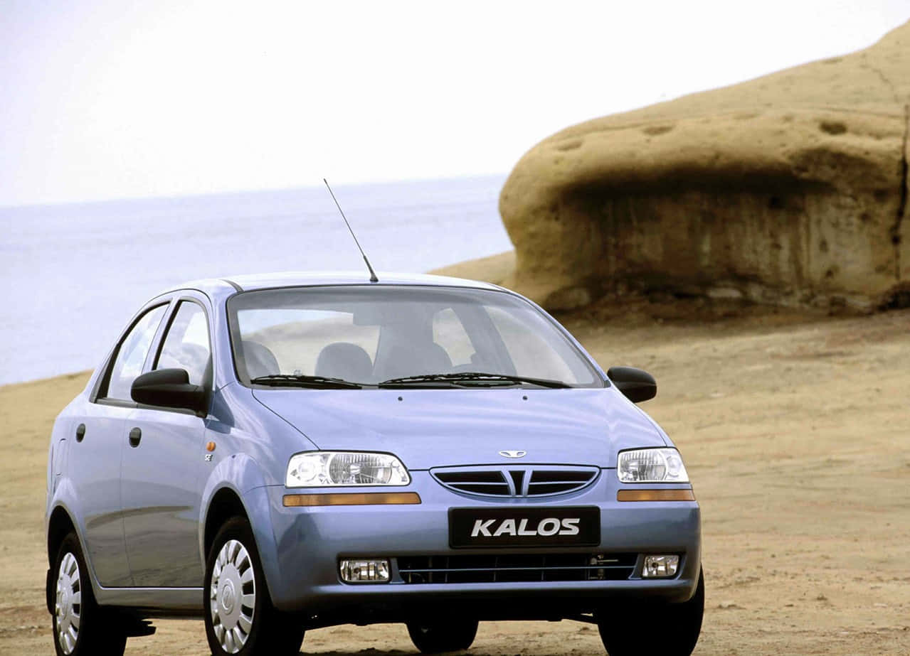 Caption: Sleek Daewoo Kalos Gliding On The Road Wallpaper