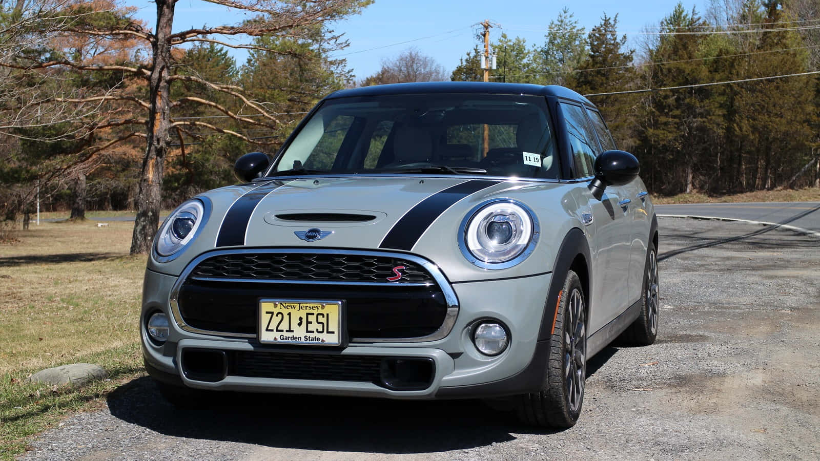 Caption: Sleek Mini Cooper Hardtop 2 Door In Dynamic Running Shot Wallpaper