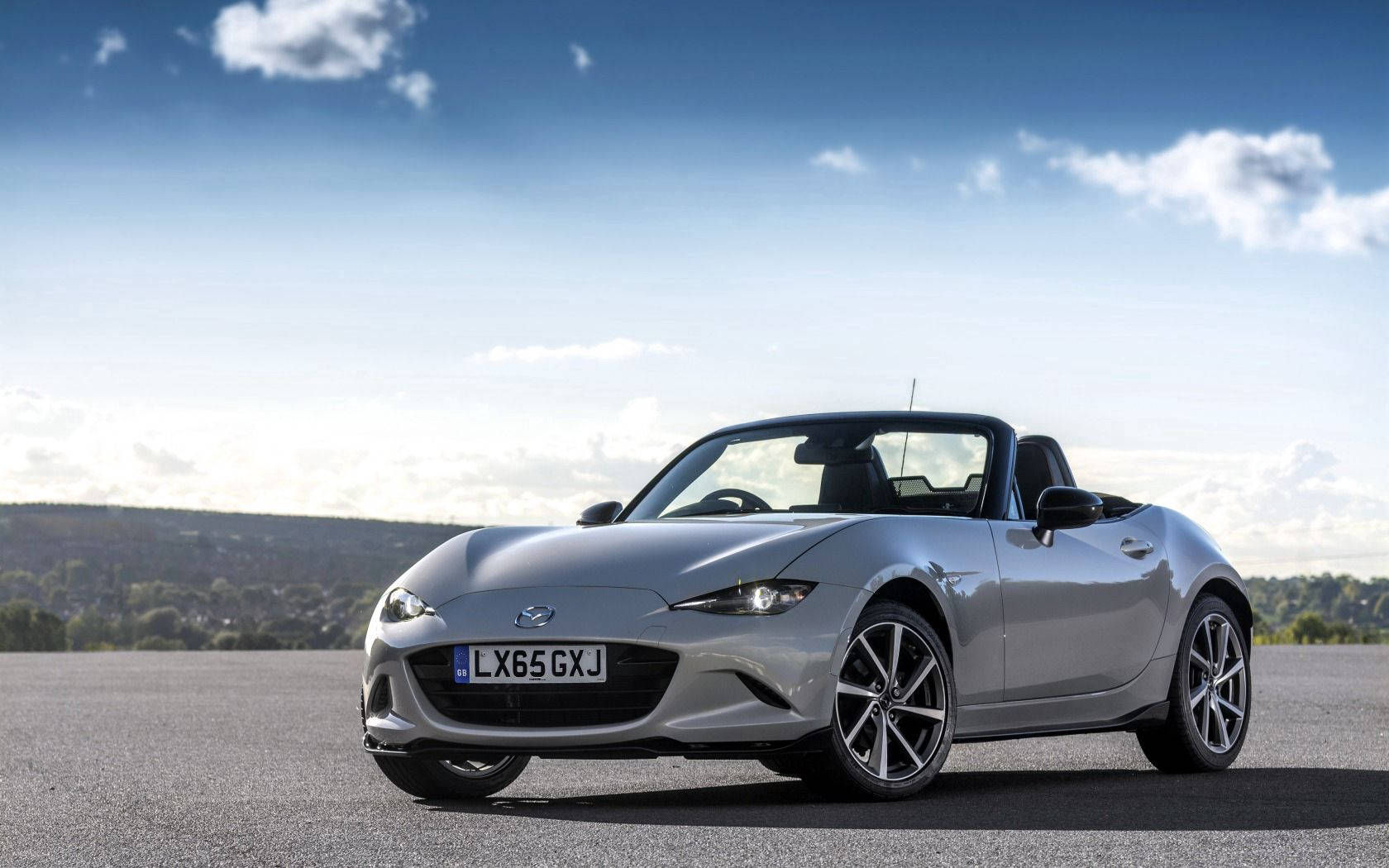 Caption: Spectacular Mazda Mx-5 Spyder Convertible In Action. Wallpaper